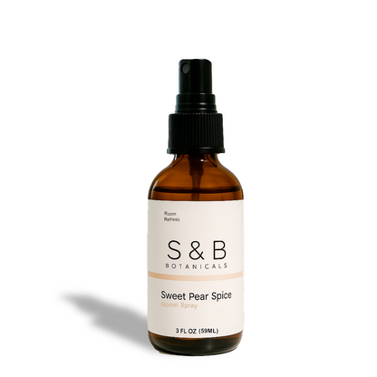 S&B Botanicals Room Spray in amber glass bottle with black pump and white label on clean white background, 2oz phthalate-free water-based clean home fragrance mist