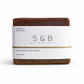 S&B Botanicals Toasted Matcha Latte Soap Bar with white kraft paper label on clean white background, 4oz handmade bar with grass-fed tallow and organic coconut milk