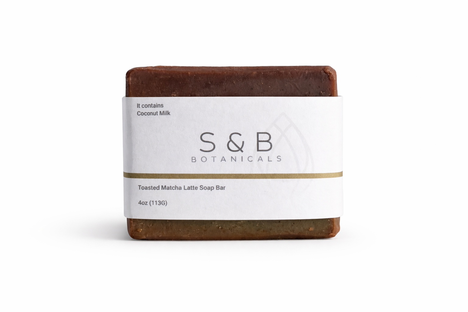 S&B Botanicals Toasted Matcha Latte Soap Bar with white kraft paper label on clean white background, 4oz handmade bar with grass-fed tallow and organic coconut milk