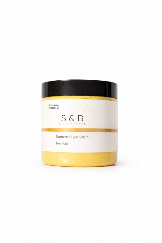 S&B Botanicals Turmeric Sugar Scrub in clear jar with black lid and white label on clean white background, 5oz brightening exfoliating body scrub with avocado oil and calendula