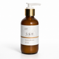 Aloe vera and botanical oil body lotion in a reusable glass bottle