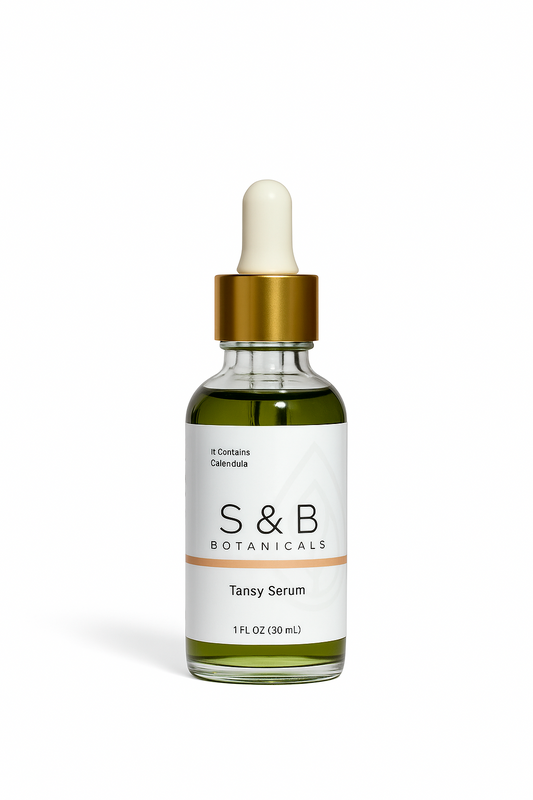 Blue tansy face serum with calendula infused oils in glass dropper bottle