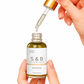 Close-up of blue tansy facial oil texture in dropper