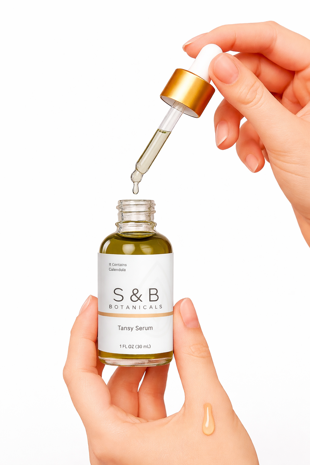 Close-up of blue tansy facial oil texture in dropper