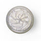Close-up of calendula body butter showing whipped texture and smooth non-greasy herbal moisturizer consistency