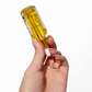 Calendula herbal glow oil applied to skin showing radiant hydrated finish