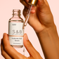 Lightweight non-greasy calendula hyaluronic acid face serum by S&B Botanicals — absorbs instantly into skin