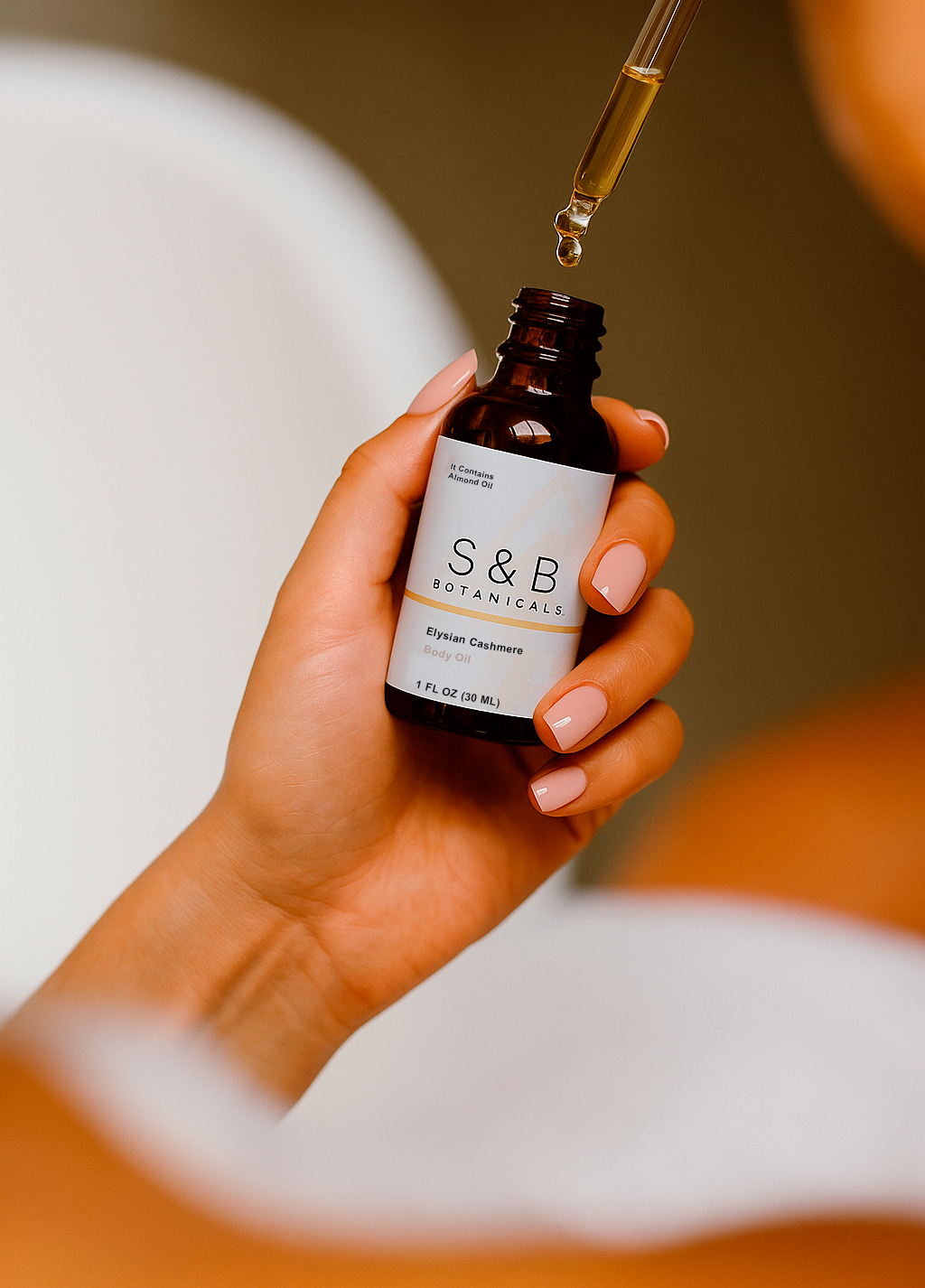 S&B Botanicals calendula infused scented body oil — available in Elysian Cashmere, Sweet Melanova, Cozy Weather Crème and Divine Paradise