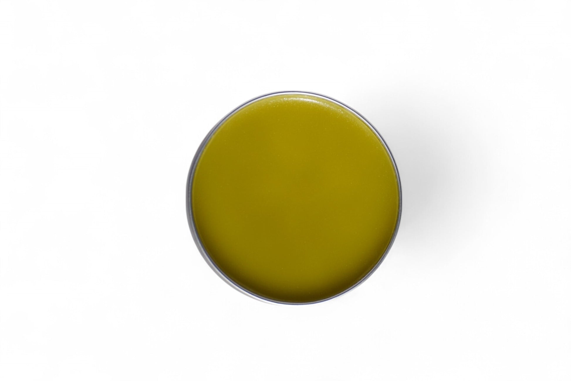 Calendula salve with calendula flowers, olive oil, and beeswax – natural herbal skincare ingredients