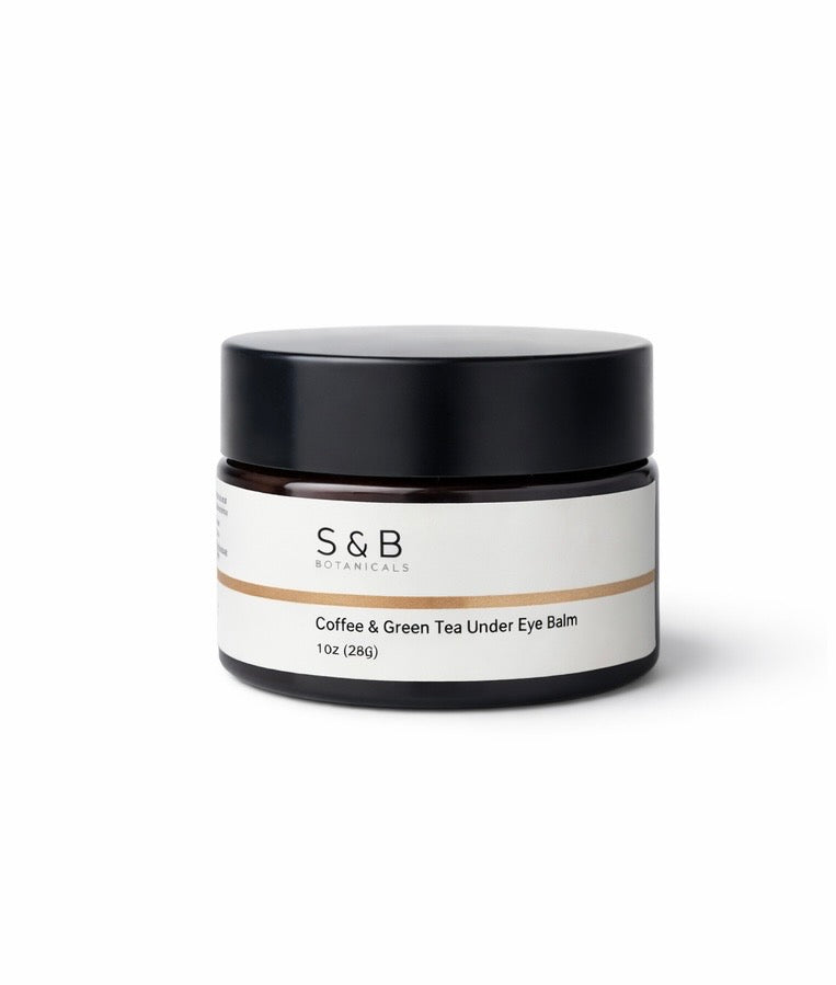 Coffee and green tea under eye balm made with grass fed tallow in a glass jar