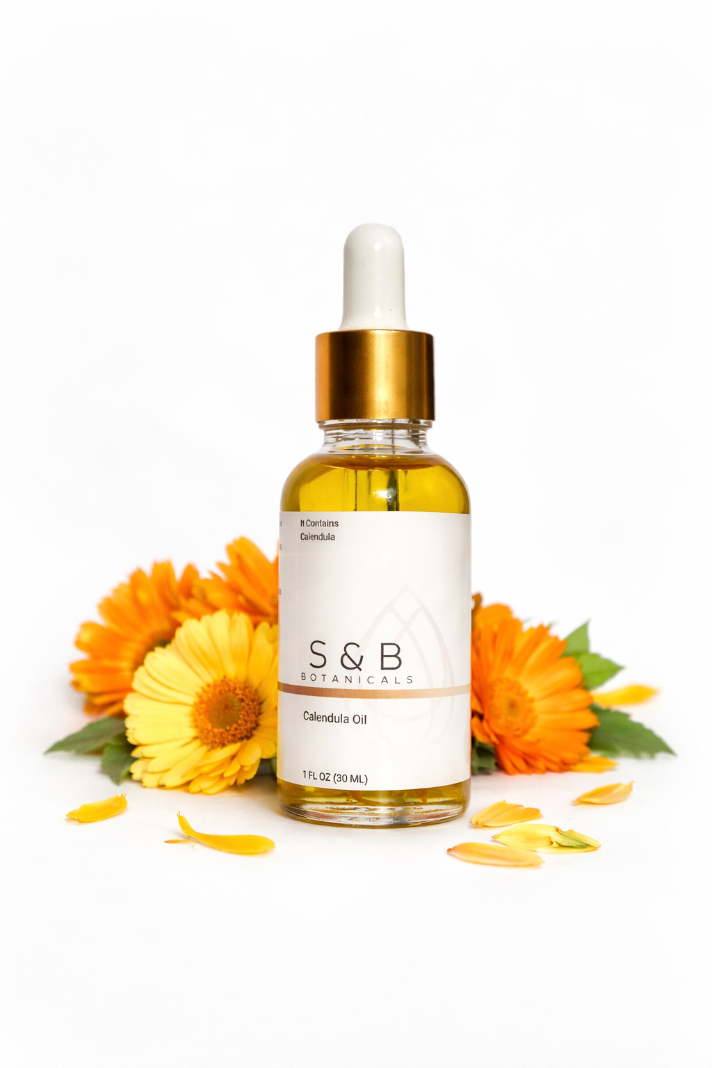 Hydrating calendula botanical face oil being applied to skin